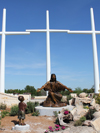 Monumental bronze life-size statue of Jesus and children at Eura Davidson Redemption Prayer Garden at Coreyell Community Church, Gatesville, Texas, by public monumental bronze sculptor, Tom White, sculptures of Jesus, Jesus and children statues, Christian sculpture monuments, parables of Jesus, parable of Sower at the Billy Graham Library bronze monument, commission a sculpture, religious monuments bronze