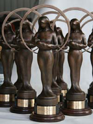 Norinne A. and Raymond E. Ruddy Memorial Life Prizes Award Trophy created by figurative bronze sculptor, Tom White, for Raymond B. and Marilyn A. Ruddy, long-time pro-life philanthropists - an initiative of the Gerard Health Foundation. Statue of a mother cherishing the life of her baby. Award given to those who do the most to promote the cause of life and against abortion bi-annually in Washington, DC., statue of mother and baby, mother and child sculpture, pro-life award trophy