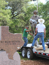 Custom portrait bronze monumental western ranch sculpture scene of Bo Rubenstein, Texas Pipe, FreBo Ranch, Columbus, TX, Hwy 71 ,Tom White monumental bronze sculptor, commission bronze portraits, public figurative bronze monuments, Western bronze sculptures, historical monumental bronzes, portrait bronze artist, commission a sculpture, cowboy ranch bronze scenes, longhorn sculptures