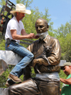 Custom portrait bronze monumental western ranch sculpture scene of Bo Rubenstein, Texas Pipe, FreBo Ranch, Columbus, TX, Hwy 71 ,Tom White monumental bronze sculptor, commission bronze portraits, public figurative bronze monuments, Western bronze sculptures, historical monumental bronzes, portrait bronze artist, commission a sculpture, cowboy ranch bronze scenes, longhorn sculptures