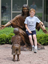 "Christ Our Rock" lifesize monument and tabletop bronze statues by Tom White, Christian Monumental Bronze Sculptor, placed in Tannersville, Pennsylvania and Gatesville, Texas at the Davidson Memorial Prayer Garden Christian sculptures, tabletop Biblical faith-based sculptures, statue of Christ, public monument, statues of Jesus welcoming children, Jesus Christ sculptures, religious monumental bronze sculptures